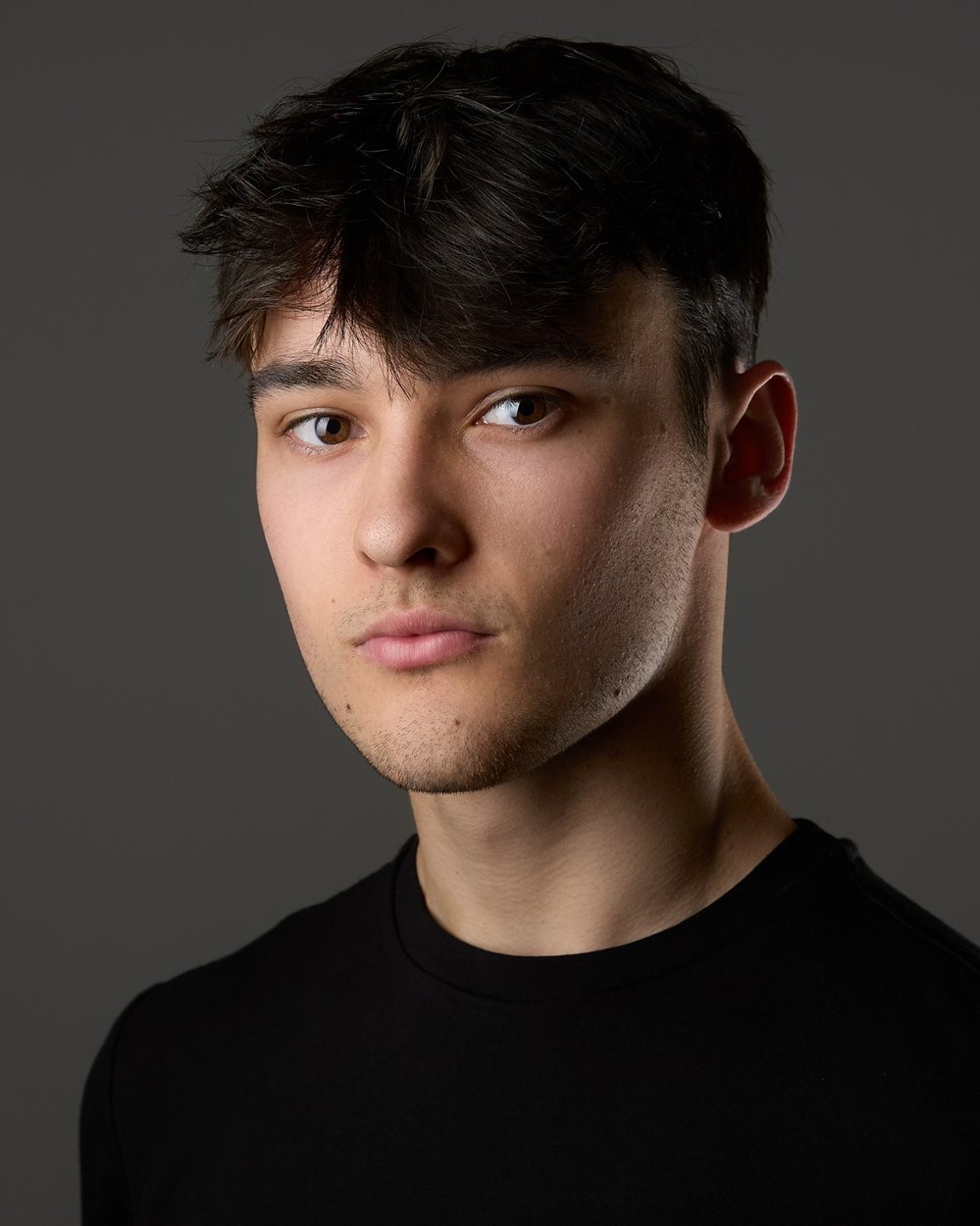 Studio headshot of Leo Miller